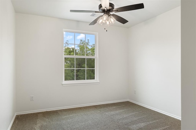 unfurnished room featuring carpet flooring and ceiling fan