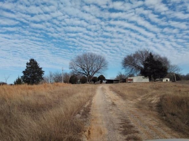 view of road with a rural view