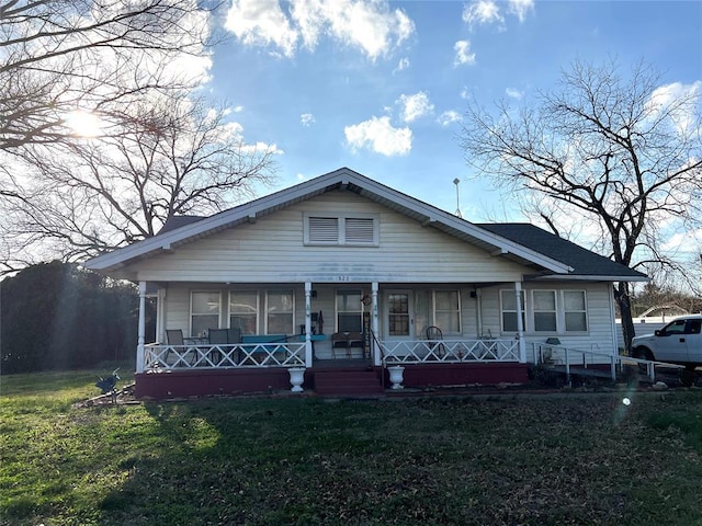 bungalow with a front lawn