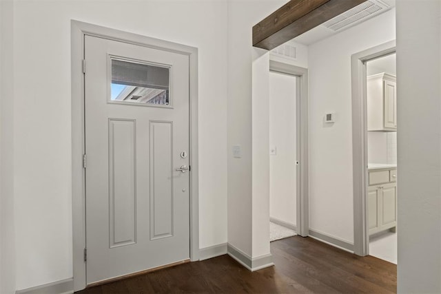 entrance foyer featuring dark wood-type flooring