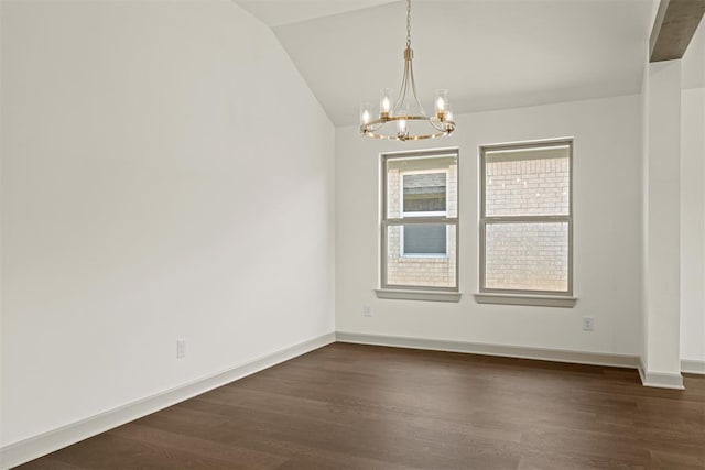 unfurnished room featuring vaulted ceiling, dark hardwood / wood-style flooring, and an inviting chandelier