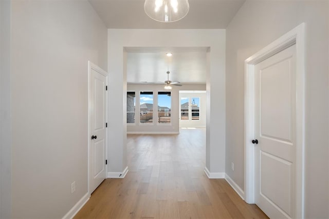 corridor featuring light hardwood / wood-style flooring