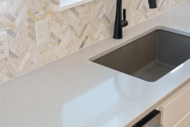 details with tasteful backsplash and sink