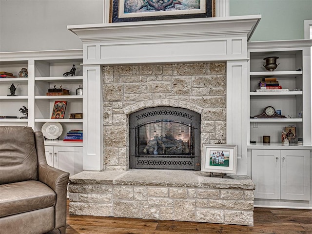 interior details with a fireplace and hardwood / wood-style floors