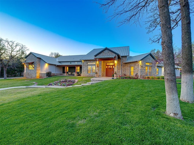 view of front of home with a front lawn