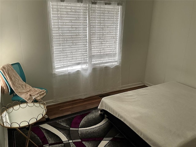 bedroom featuring hardwood / wood-style floors