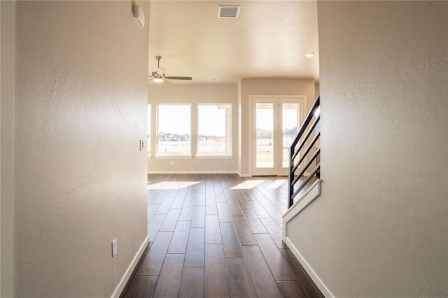 interior space with dark hardwood / wood-style floors