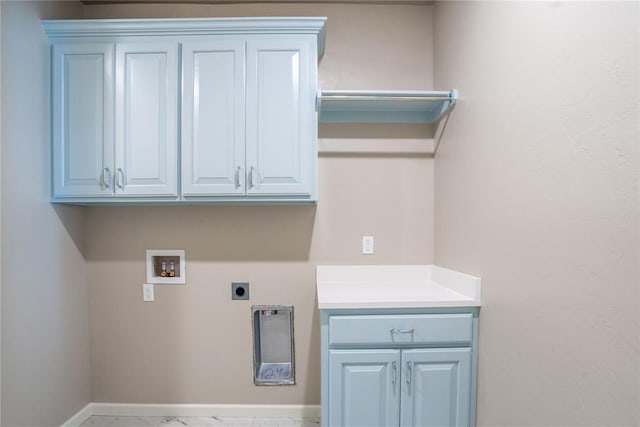 laundry room featuring electric dryer hookup, cabinets, and hookup for a washing machine