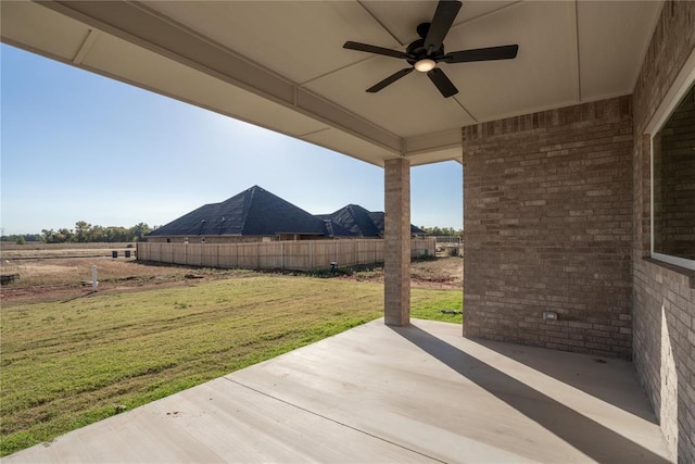 view of patio / terrace featuring ceiling fan