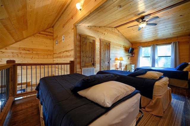 bedroom featuring lofted ceiling, dark wood-type flooring, and wooden walls