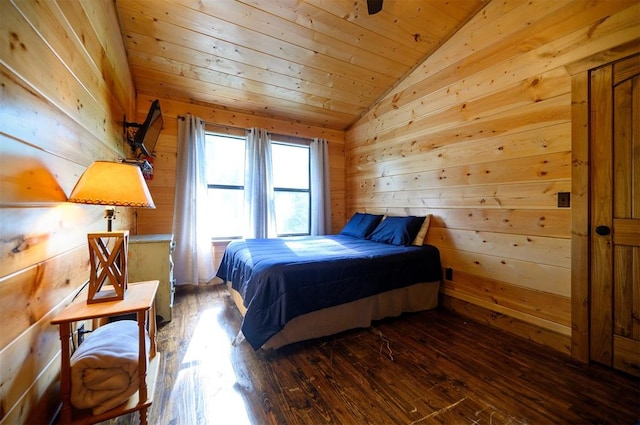 bedroom with wood ceiling, dark hardwood / wood-style floors, lofted ceiling, and wooden walls