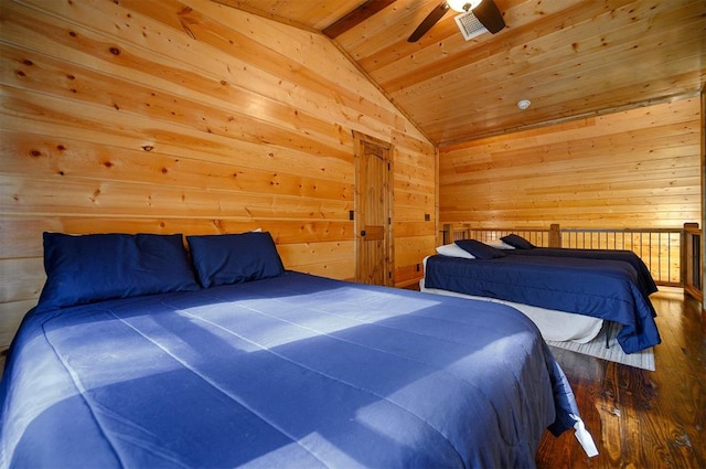 bedroom featuring ceiling fan, wooden walls, hardwood / wood-style flooring, wooden ceiling, and lofted ceiling