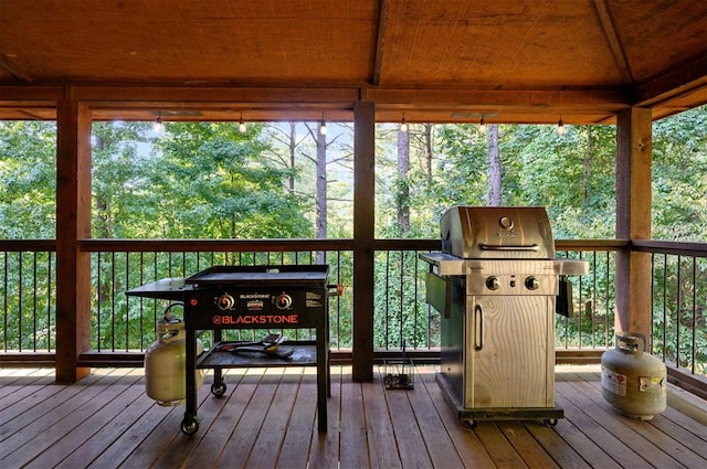 deck featuring a grill