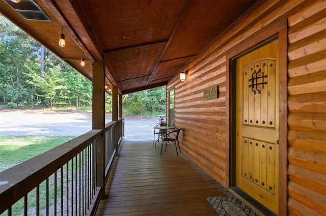 wooden deck with a porch