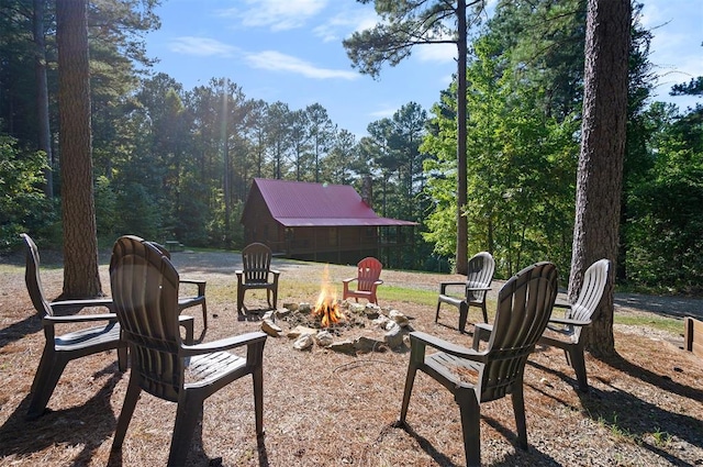 view of patio with a fire pit