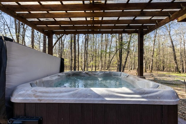 wooden terrace with a hot tub