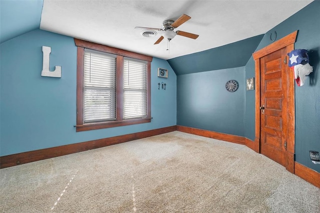 bonus room featuring ceiling fan, lofted ceiling, and carpet floors