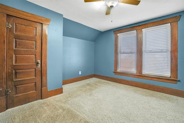 bonus room featuring ceiling fan, carpet, and vaulted ceiling