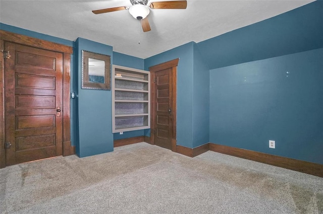 unfurnished bedroom with carpet and ceiling fan