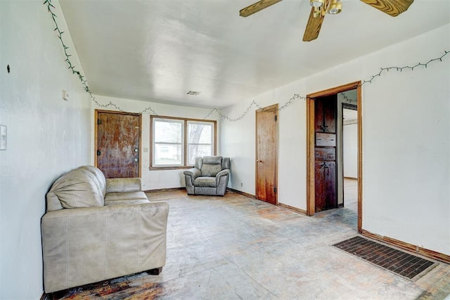 living room with ceiling fan