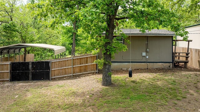 view of yard featuring a carport