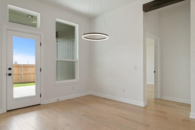 entryway with light hardwood / wood-style flooring