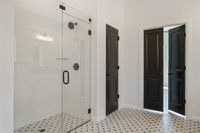 bathroom with an enclosed shower