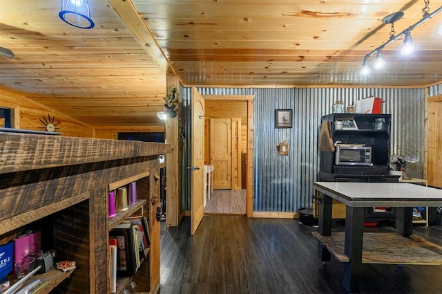 rec room featuring wood walls, dark hardwood / wood-style flooring, and wooden ceiling