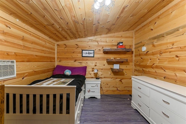 unfurnished bedroom featuring wood ceiling, wooden walls, dark hardwood / wood-style floors, and vaulted ceiling