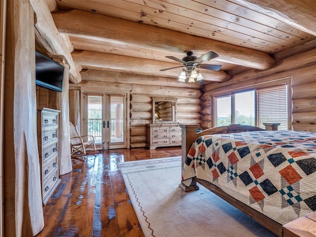 bedroom with ceiling fan, multiple windows, rustic walls, and french doors