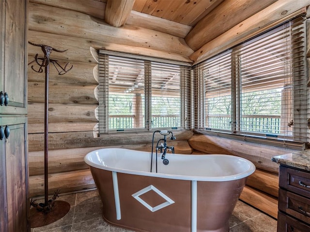 bathroom with wooden ceiling, a bathtub, and rustic walls