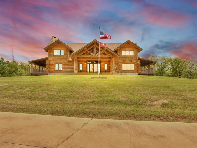 cabin with a yard