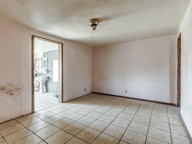 view of tiled spare room