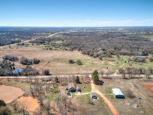 aerial view featuring a rural view and a water view