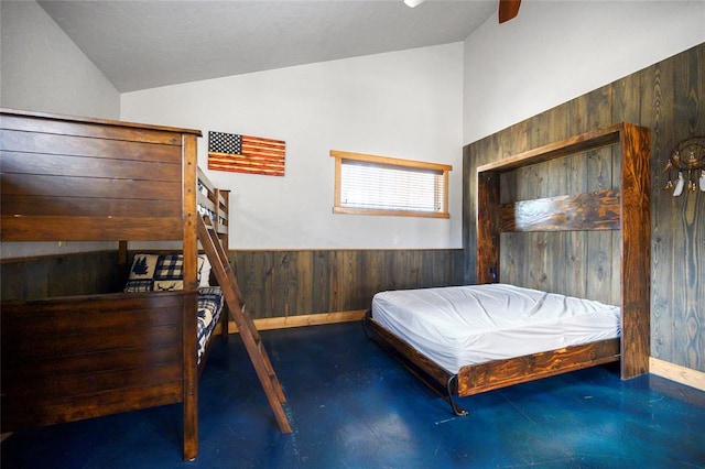 bedroom featuring ceiling fan, lofted ceiling, billiards, and wooden walls