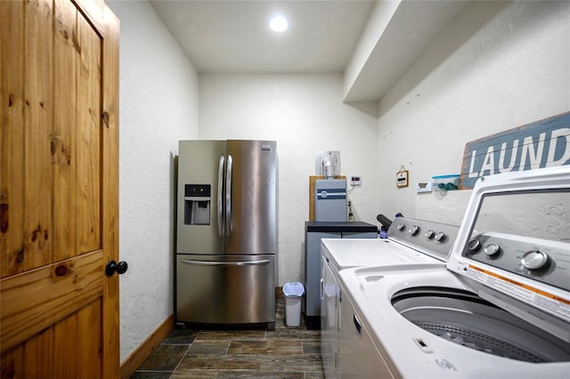 44 Blue Ivey Cir, Broken Bow, OK 74728 - laundry room featuring independent washer and dryer and a textured wall
