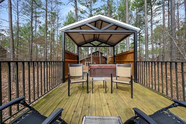 deck with a hot tub