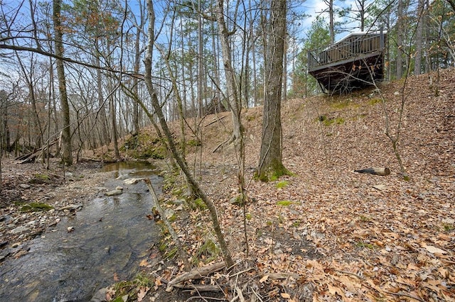 44 Blue Ivey Cir, Broken Bow, OK 74728 - view of yard featuring a wooden deck