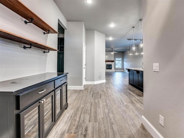 hall with light wood-type flooring