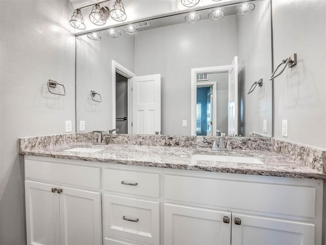 bathroom featuring vanity