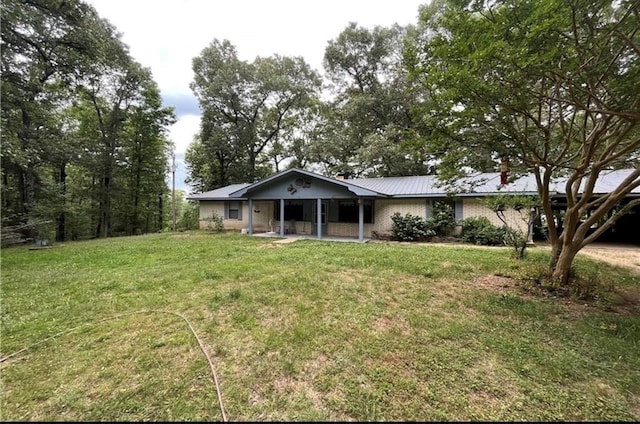 view of front of property with a front lawn