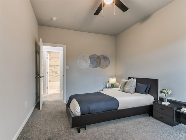 carpeted bedroom featuring a ceiling fan and baseboards