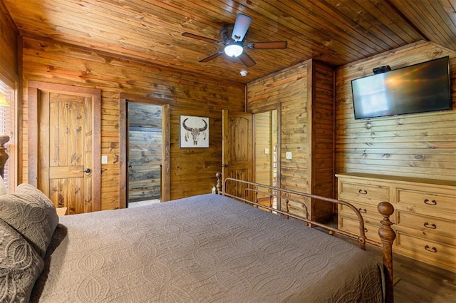 unfurnished bedroom featuring wood ceiling, ceiling fan, and wood walls