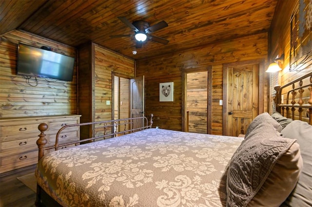 bedroom featuring wooden walls, ceiling fan, wood ceiling, and wood-type flooring