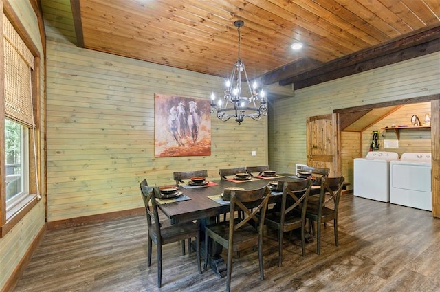 dining space with washing machine and clothes dryer, dark hardwood / wood-style floors, a notable chandelier, wood walls, and wood ceiling