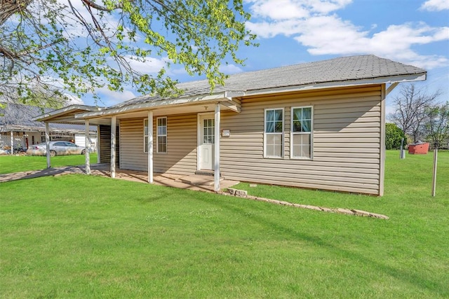 view of front of property with a front lawn