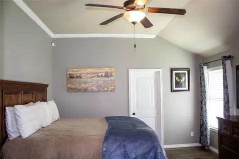 bedroom with ornamental molding, ceiling fan, and lofted ceiling