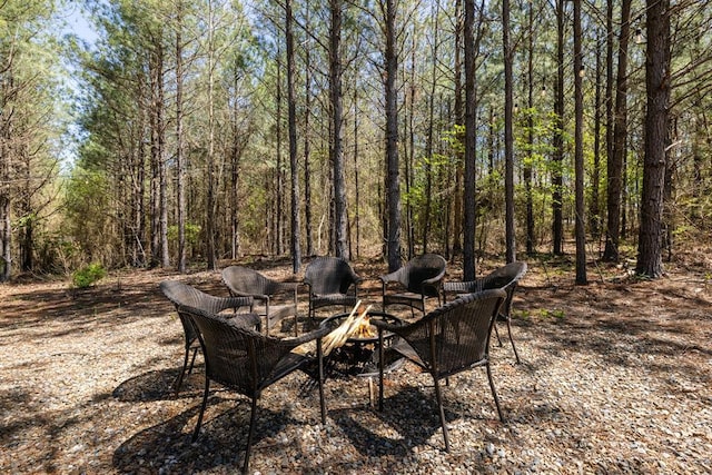 view of patio / terrace with a fire pit