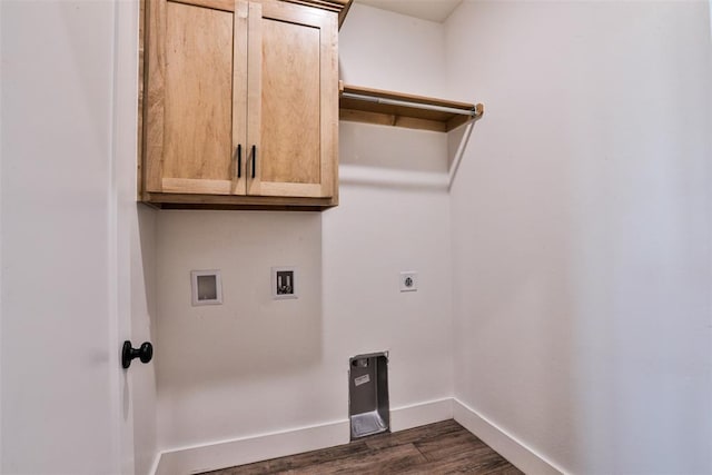 clothes washing area with cabinets, washer hookup, dark hardwood / wood-style flooring, and hookup for an electric dryer