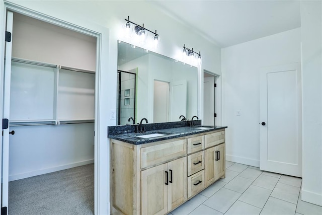 bathroom with vanity and tile patterned floors